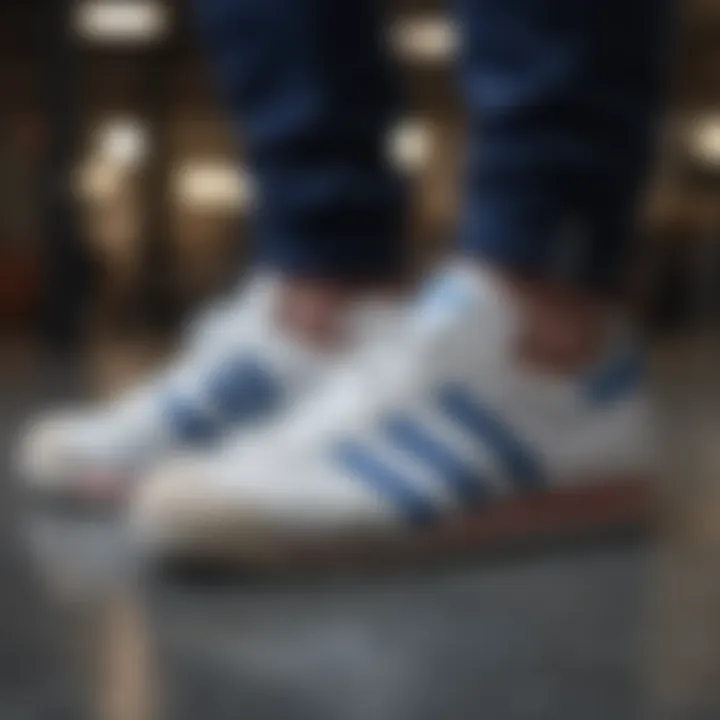 An iconic adidas shoe featuring blue stripes