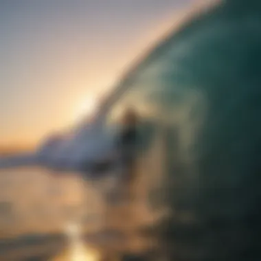 A surfer preparing to catch a wave at sunset