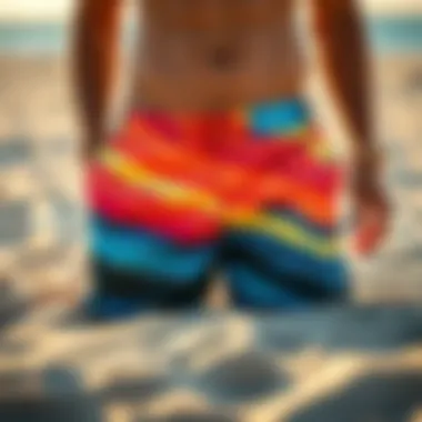 Vibrant board shorts displayed on a sandy beach