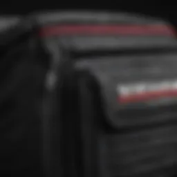 A close-up view of a black Vans fanny pack showcasing its detailed stitching and design.