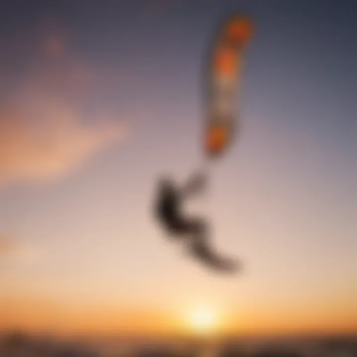 A skilled kiteboarder executing a jump with a Cabrinha kite against a sunset backdrop.