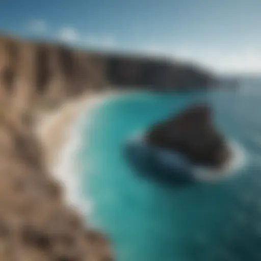 A breathtaking view of the cliffs along the Aruba coastline with turquoise waters below