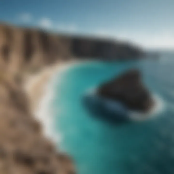 A breathtaking view of the cliffs along the Aruba coastline with turquoise waters below