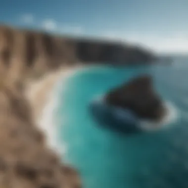 Stunning Cliffside Landscape A breathtaking view of the cliffs along the Aruba coastline with turquoise waters below
