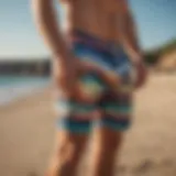 Vibrant printed shorts displayed on a beach setting