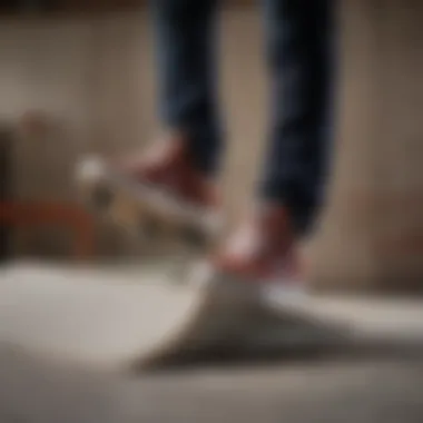 Skateboarder performing tricks while wearing DVS shoes on a ramp