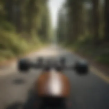 A group of longboarders enjoying a downhill ride on a forested road.