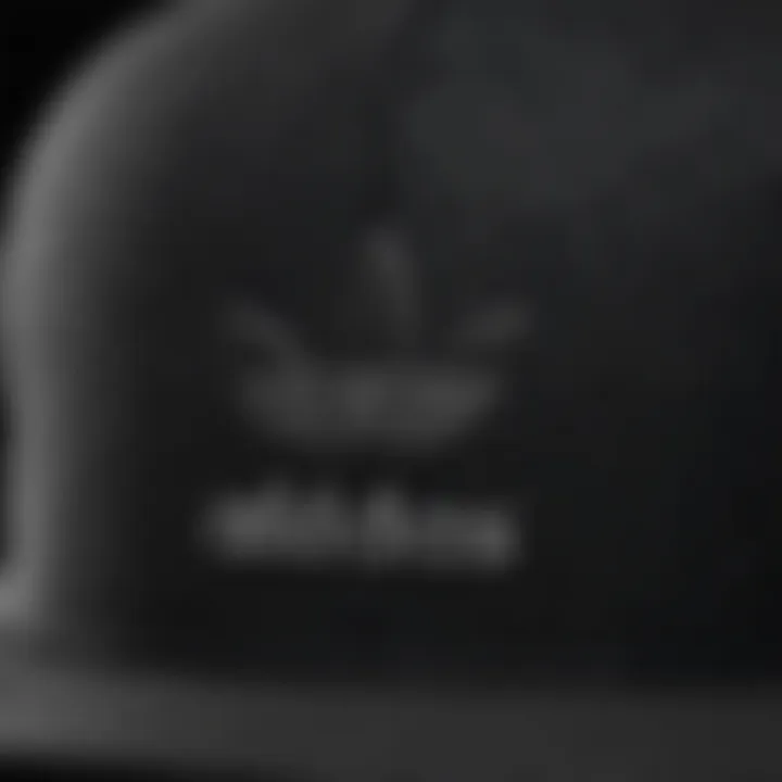 Close-up view of the fabric and stitching details of an Adidas snapback hat.