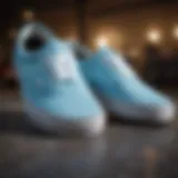 A close-up view of light blue Vans showcasing design details.