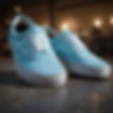 A close-up view of light blue Vans showcasing design details.