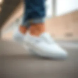 Sleek design of all-white slip-on Vans showcasing their minimalistic appeal