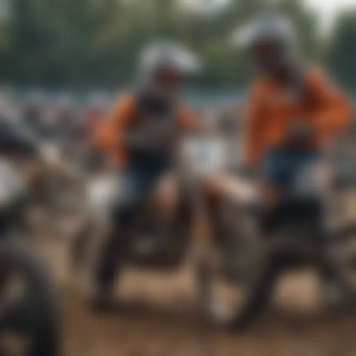 A group of motocross enthusiasts sharing tips in a pit area