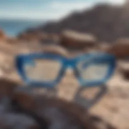 Close-up of clear blue ray glasses on a rocky outdoor surface