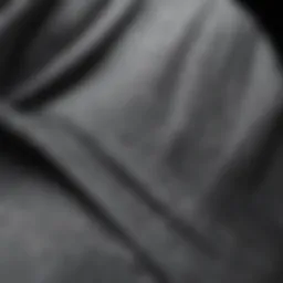 Close-up view of a textured grey hoodie fabric