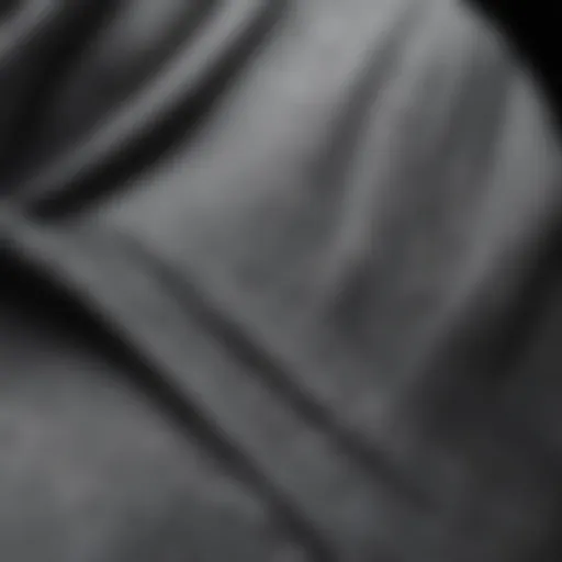 Close-up view of a textured grey hoodie fabric