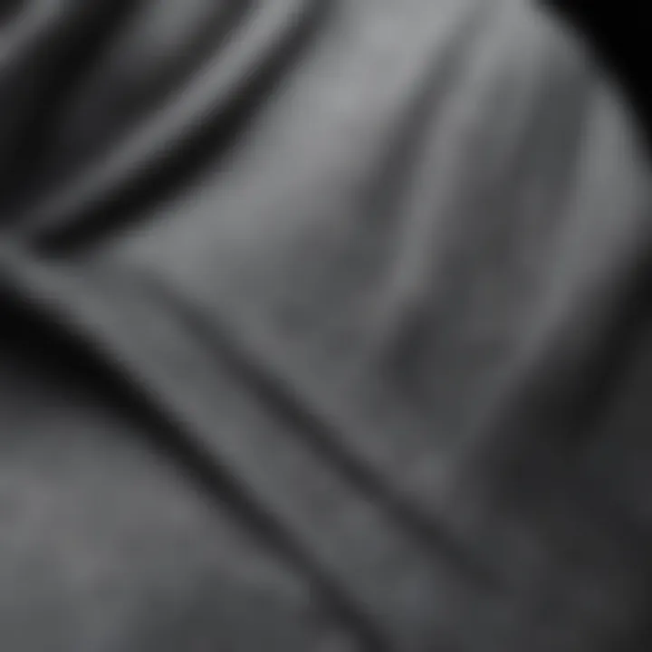 Close-up view of a textured grey hoodie fabric