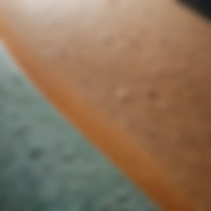 A close-up view of the texture and build of a foamie surfboard, highlighting its unique features.