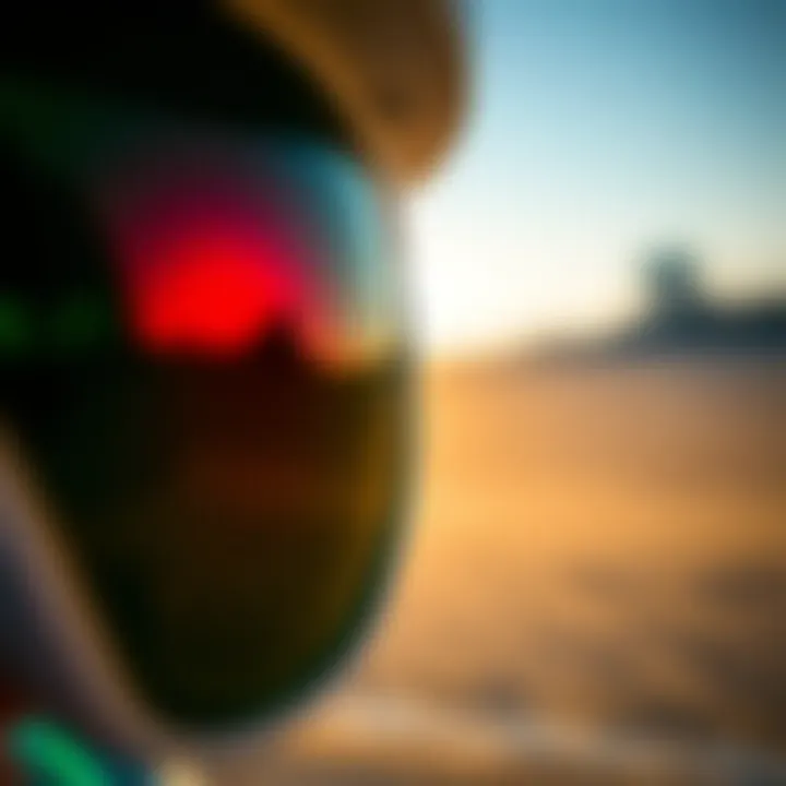 A close-up view of grey green sunglass lenses reflecting a vibrant outdoor scene
