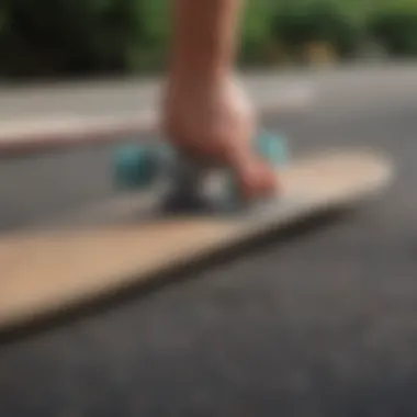 A skateboard deck being prepared with Landyachtz grip tape application