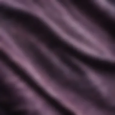 Detailed view of the unique texture and design of purple acid wash denim.