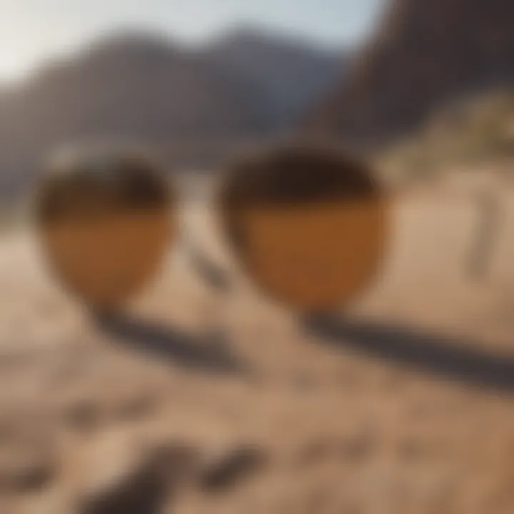 Ray-Ban oval metal sunglasses placed on a rugged surface, symbolizing durability and adventure.