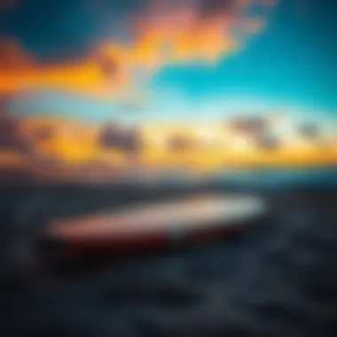 Surfboard at Tavarua Beach During Sunset Surfboard resting on the sandy beach of Tavarua against a vibrant sunset.
