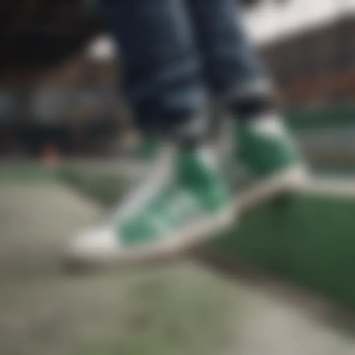 A close-up of green and white Adidas high tops on a skate park ramp