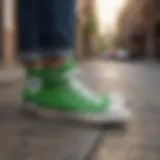 Vibrant green Chuck Taylors on a city street