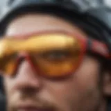 A close-up view of mirrored Wayfarers against a backdrop of extreme sports gear.