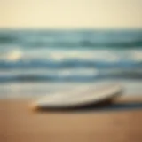 A beautifully crafted wooden skimmer board on a beach