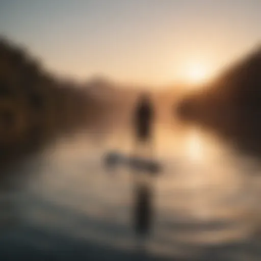 A serene paddle boarding scene at sunrise