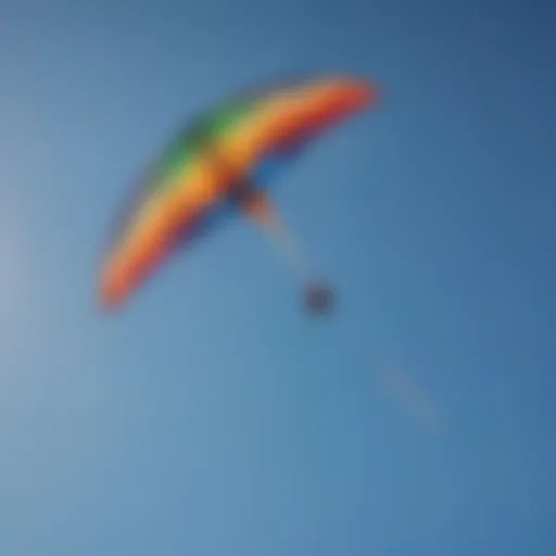 Colorful single line parafoil kite soaring in a clear blue sky
