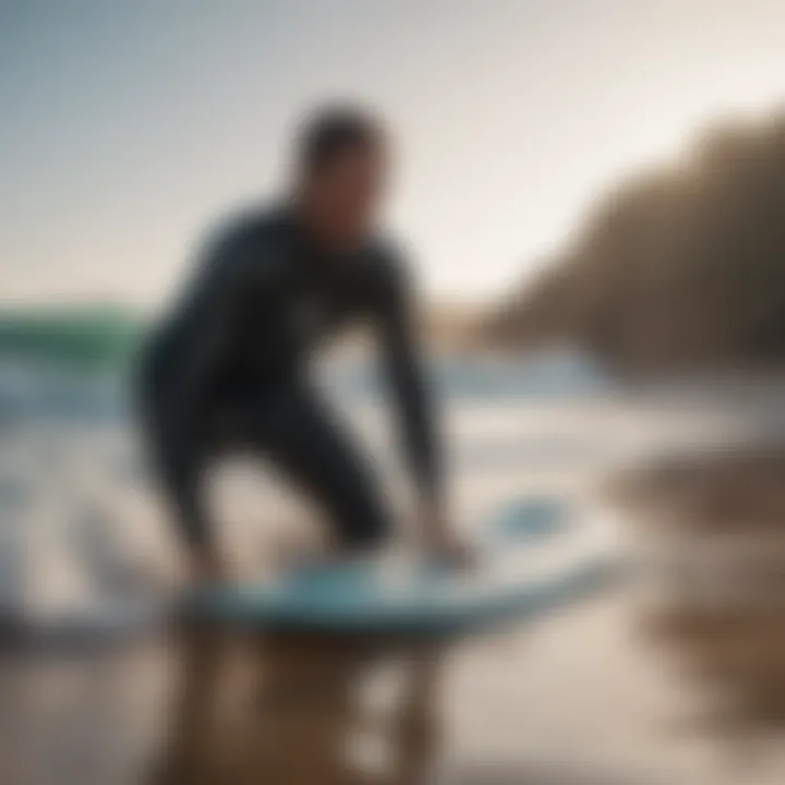 Surfer using a rinse kit to clean gear