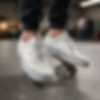 Vans Era White Leather in Action Vans Era White Leather worn during a skateboarding session, highlighting performance.