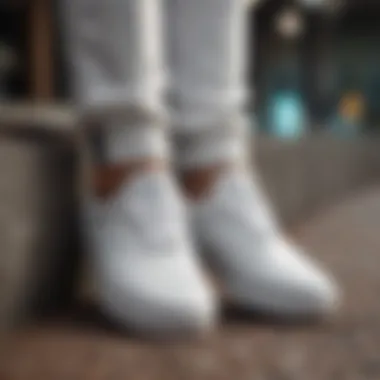 Stylish outfit pairing featuring Vans Era White Leather sneakers.