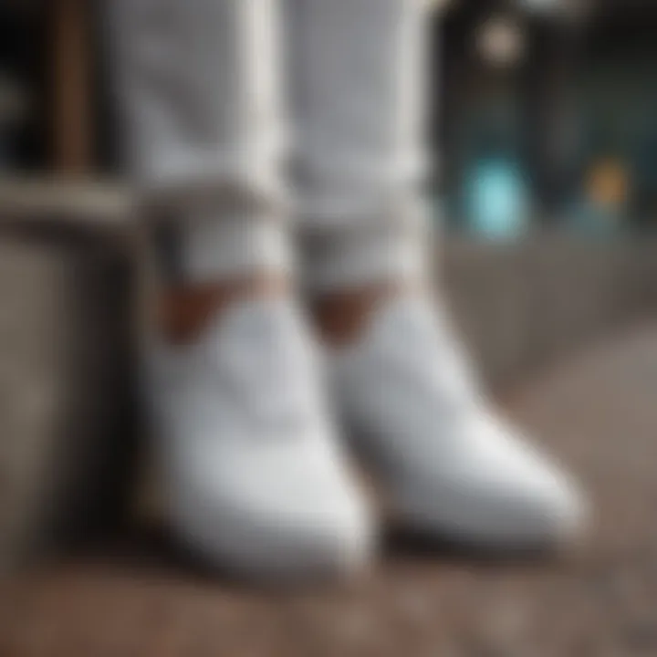 Stylish outfit pairing featuring Vans Era White Leather sneakers.