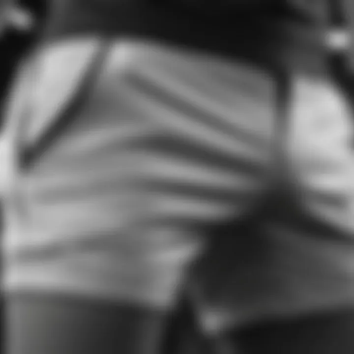 Close-up of black and white shorts made from high-performance material, highlighting texture and design.