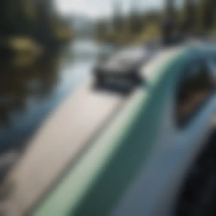 Close-up view of a paddle board securely mounted on a Toyota Tacoma rack