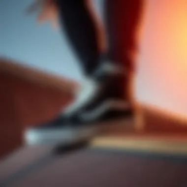 Vans black high tops on a skateboarding ramp