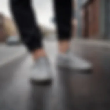 Urban setting showcasing the versatility of black and white Vans Slip-Ons