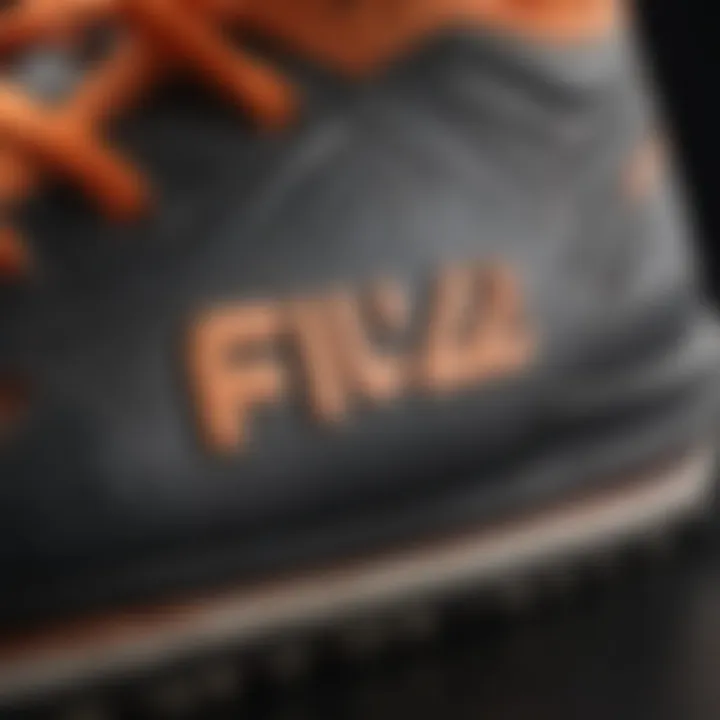 Close-up of the sole of Fila Oakmont TR Orange highlighting its traction and grip features.