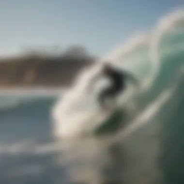 A surfer riding a wave at Huntington Beach