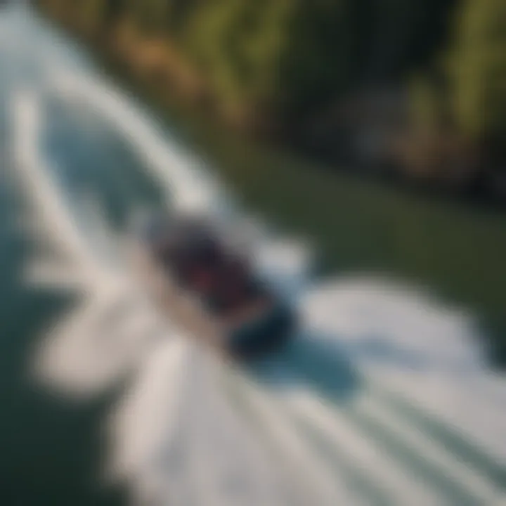 An aerial shot of a wakeboard boat surrounded by enthusiastic riders