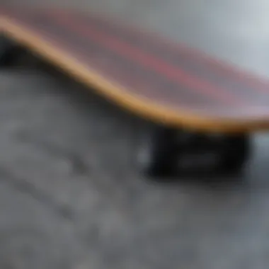 A close-up view of a skateboard deck showcasing grip tape texture