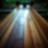 Close-up view of the intricate bamboo layering in the longboard deck