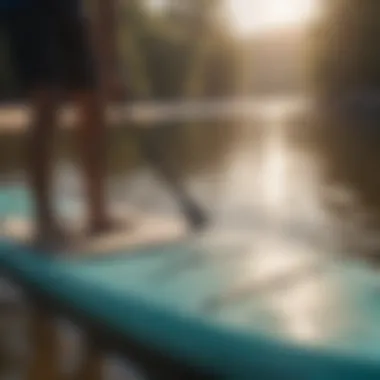 A professional inspecting an inflatable paddle board for repairs.