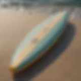 A close-up view of a small foam surfboard showcasing its design and texture.