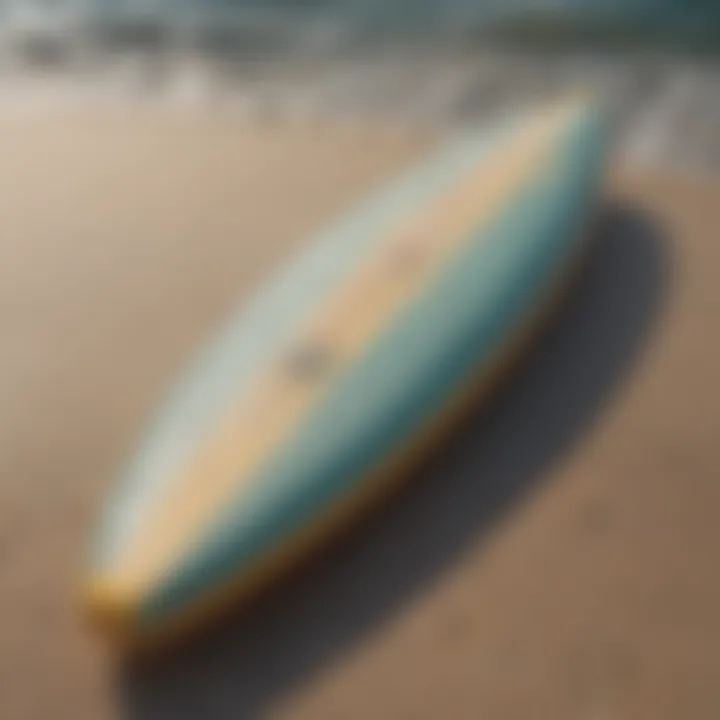 A close-up view of a small foam surfboard showcasing its design and texture.