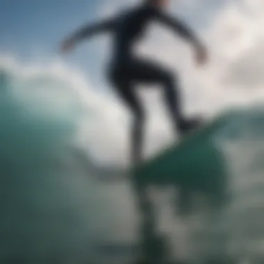 Surfer wearing booties while catching a wave