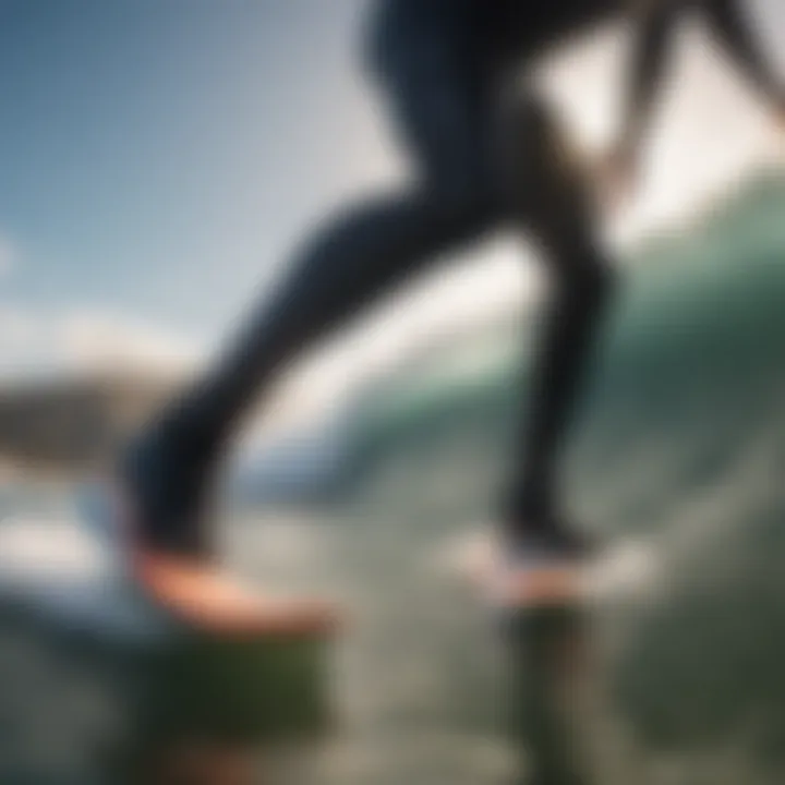 Surfer wearing neoprene socks in action on the waves